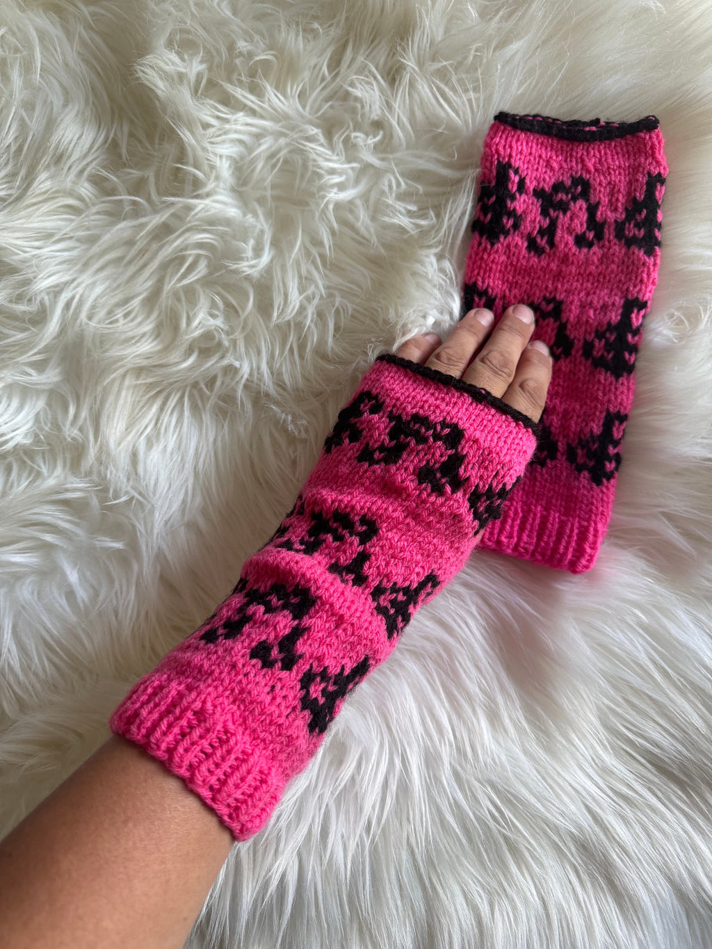 Knitted Arm Warmers: Pink Acrylic Wrist Cuffs with Music Notes
