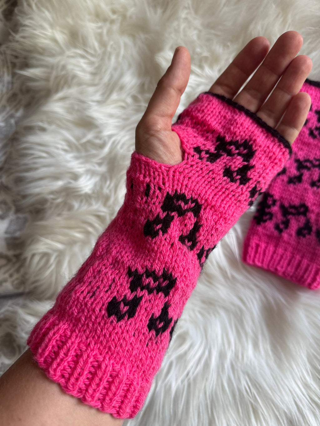 Knitted Arm Warmers: Pink Acrylic Wrist Cuffs with Music Notes